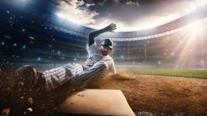 Baseball player sliding onto a base